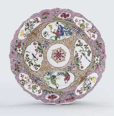 YONGZHENG (1723-35) AN UNUSUAL FAMILLE ROSE EGGSHELL FOLIATE-RIMMED DEEP PLATE